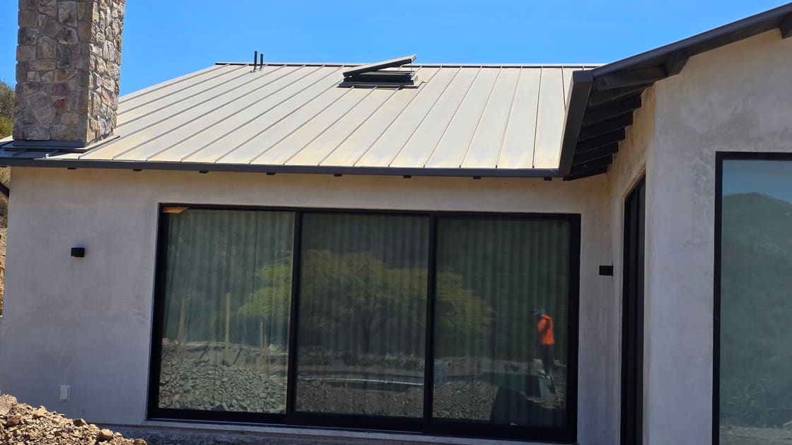 A wall of sliding glass cleaned by Over the Top Window Cleaning